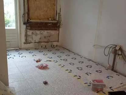Werk in uitvoering tijdens een renovatieproject van KOZ BOUW BV.