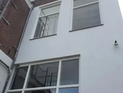 Gevel- en buitenrenovatie uitgevoerd door KOZ BOUW BV.