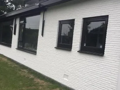Gevel- en buitenrenovatie uitgevoerd door KOZ BOUW BV.
