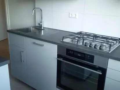 Nieuwe keuken als onderdeel van een complete woningrenovatie.